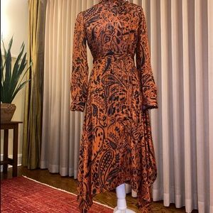 Topshop Asymmetrical Dress in an Orange Rust and Black Paisley.  Worn once.